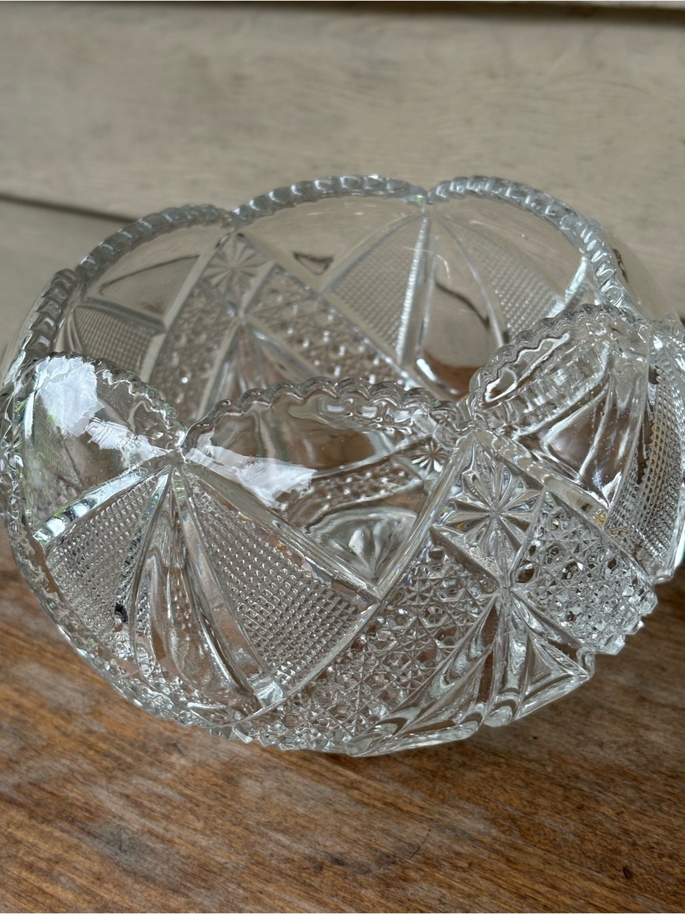 VTG crystal sphere vase features a detailed starburst design on the base